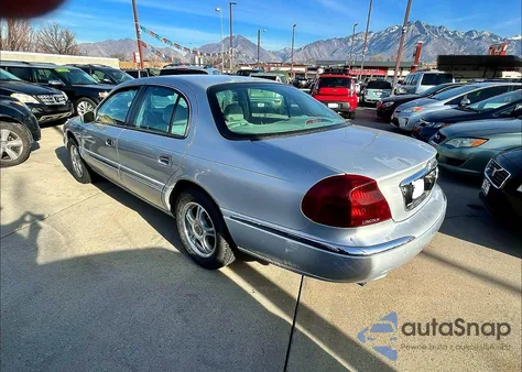 2001 Lincoln Continental z USA, uszkodzony, nr VIN 1LNHM97V71Y604107